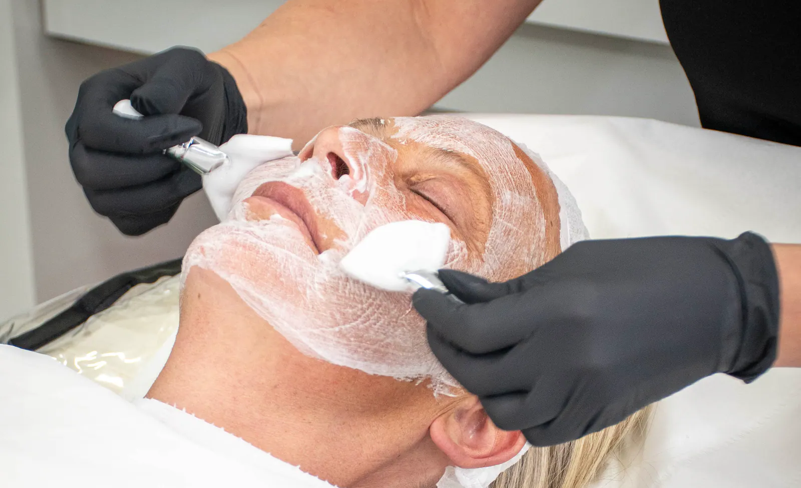 A facial skin treatment being carried out in the clinic.
